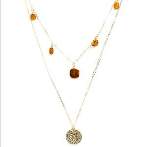 Multirow gold toned necklace